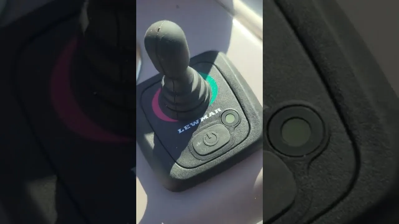 A still from Fatboy Boat Supplies: a Lewmar thruster joystick mounted at a helm.